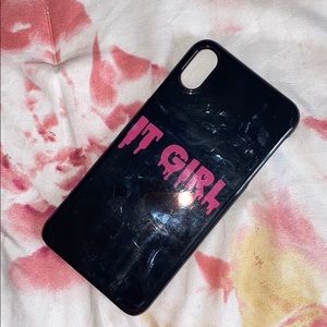 black iPhone 10xs Max.